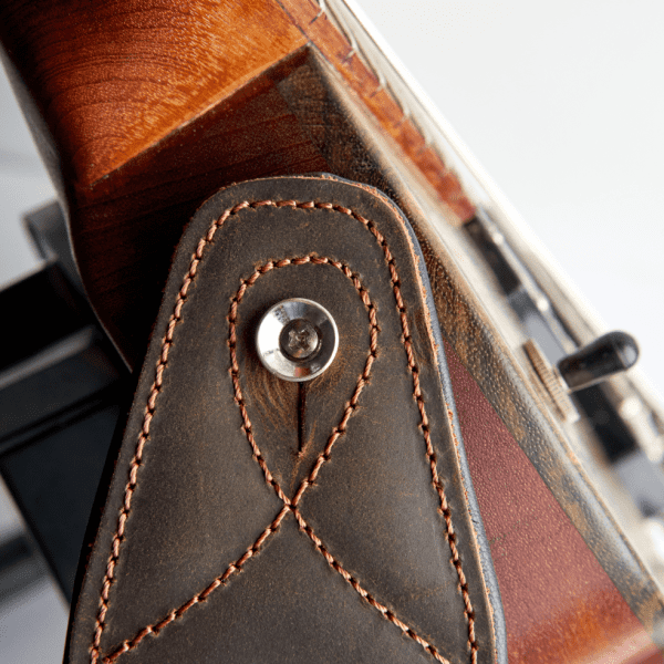 Closeup of a leather guitar strap made by ds custom guitars