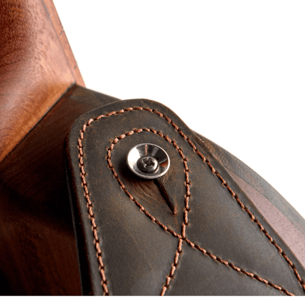 Closeup of a leather guitar strap made by ds custom guitars